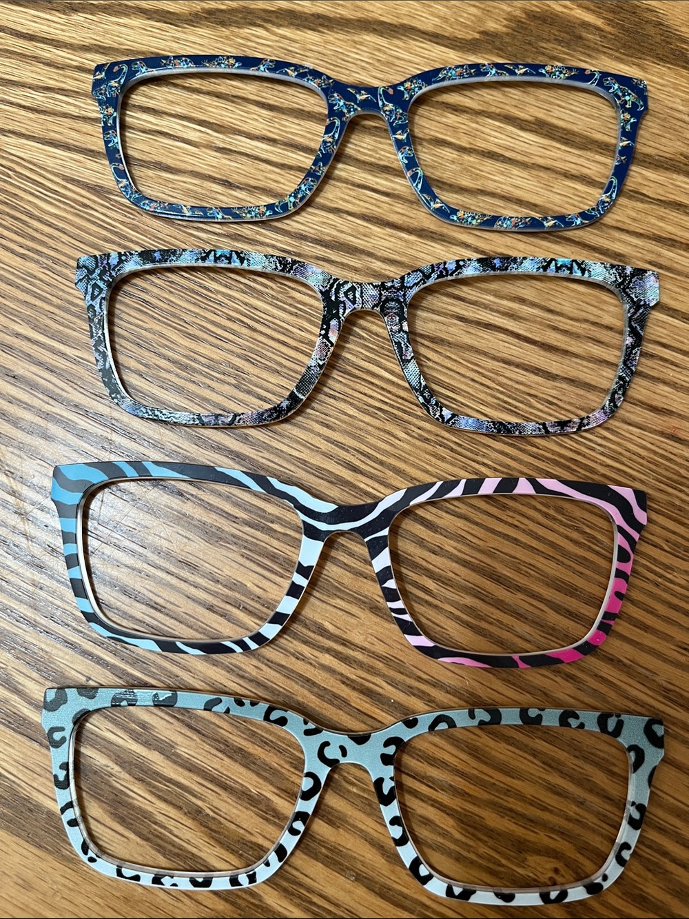 Pair Eyewear Larkin Toppers in animal print patterns. Lot of 4.